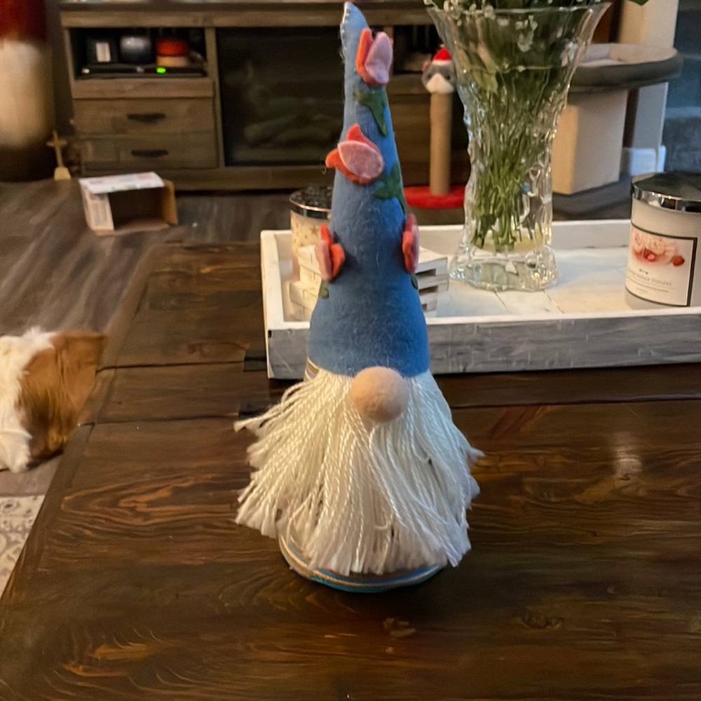 Spring gnome with tulips on the hat